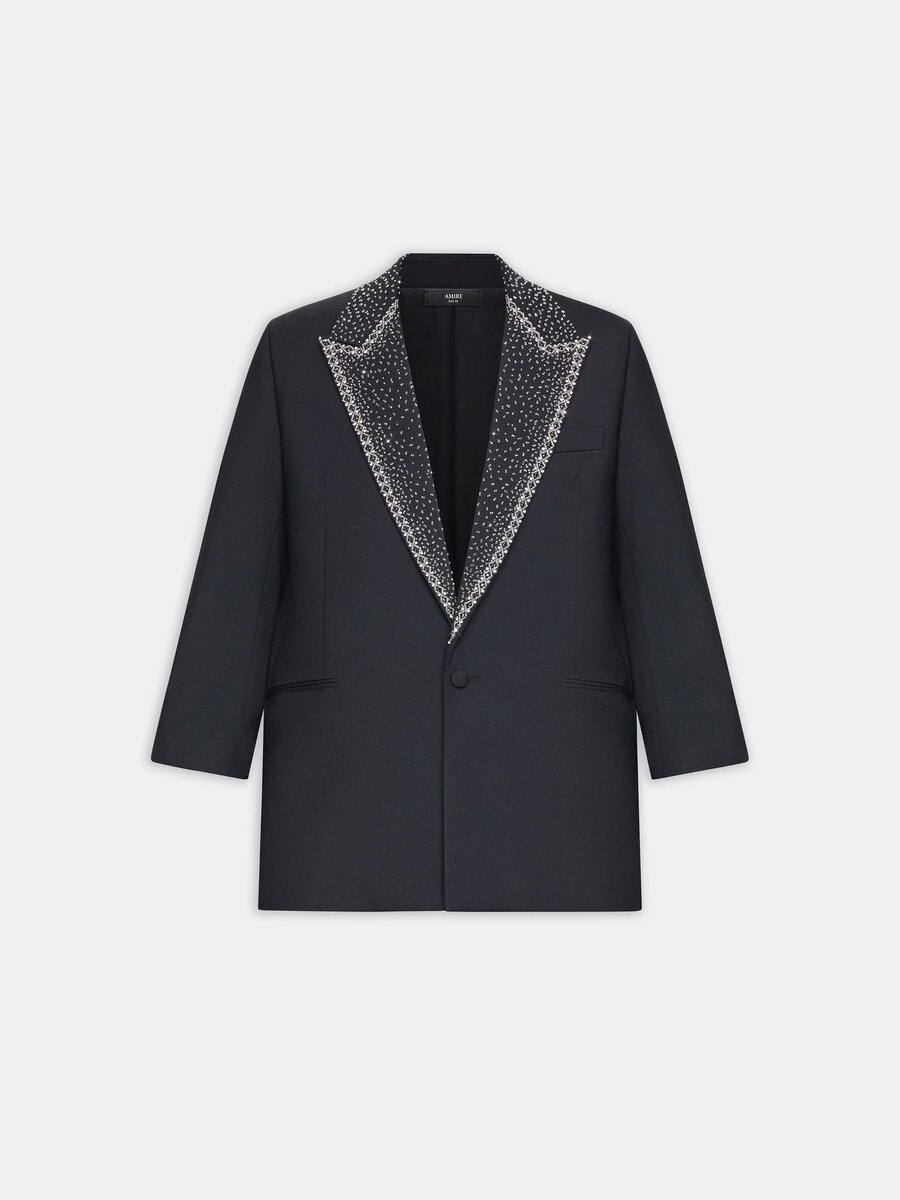 Blazer à simple boutonnage avec revers orné