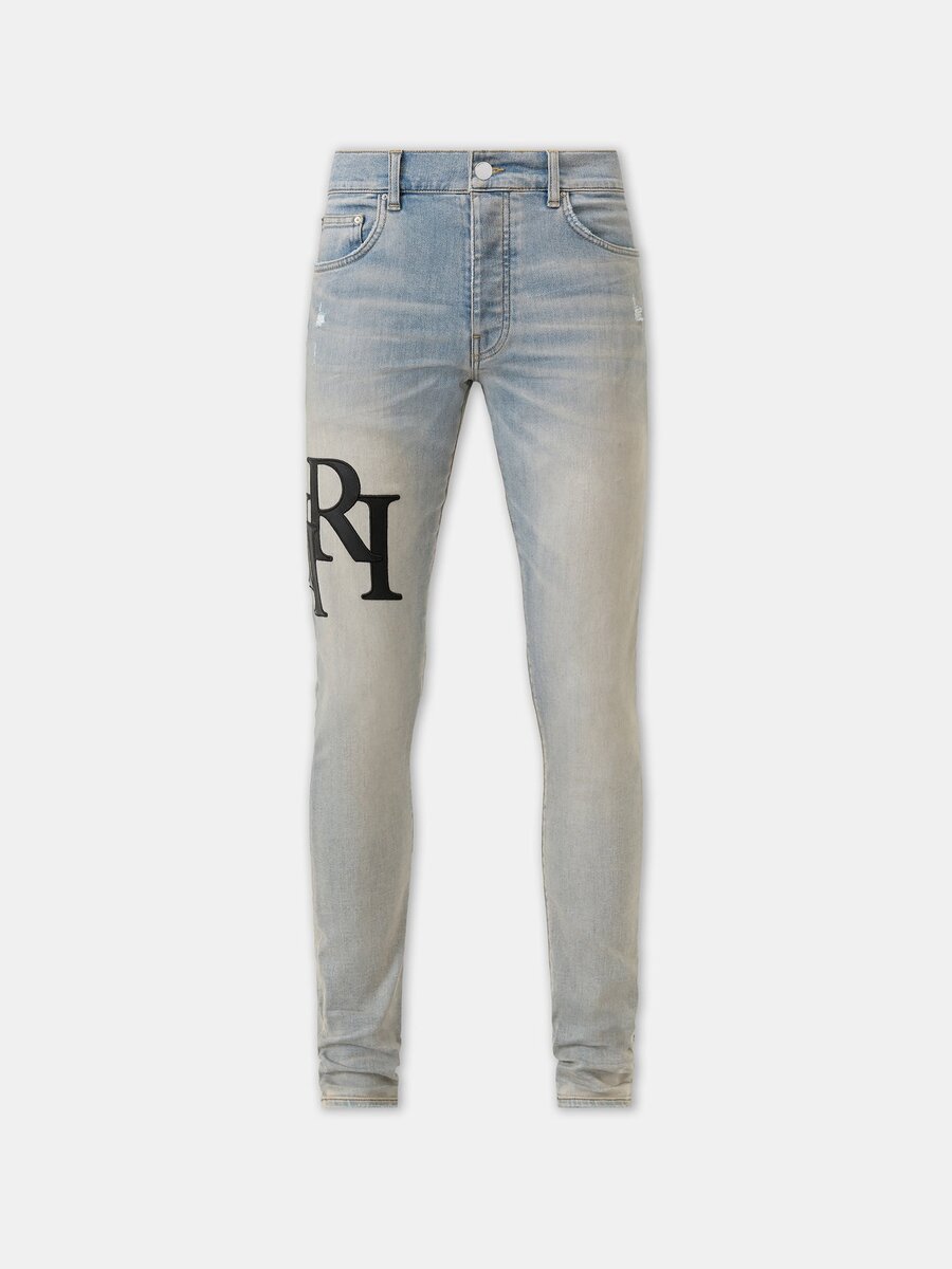 JEAN SKINNY AVEC LOGO DÉCALÉ
