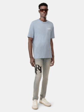 JEAN SKINNY AVEC LOGO DÉCALÉ