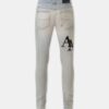 JEAN SKINNY AVEC LOGO DÉCALÉ