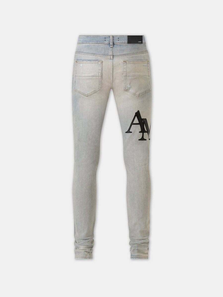 JEAN SKINNY AVEC LOGO DÉCALÉ