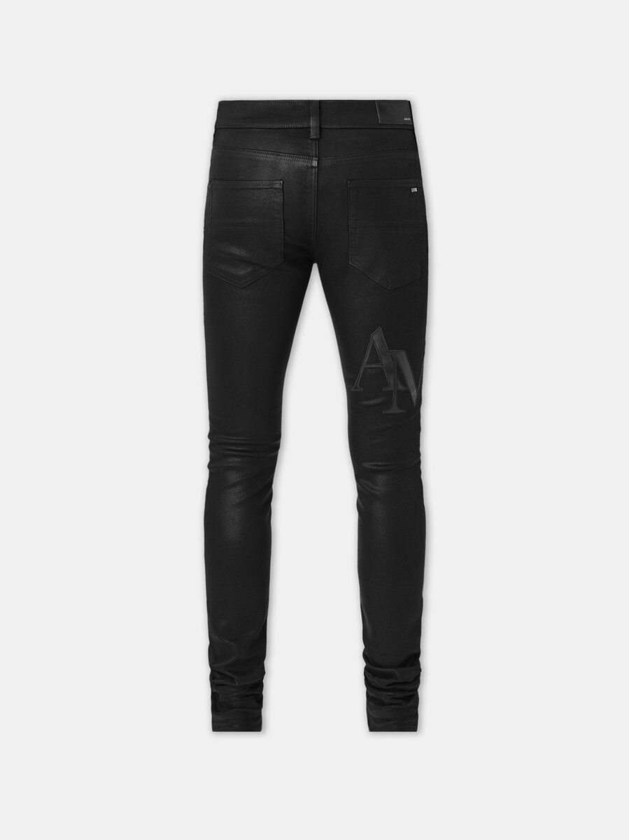 JEAN SKINNY AVEC LOGO DÉCALÉ ET EFFET CIRE