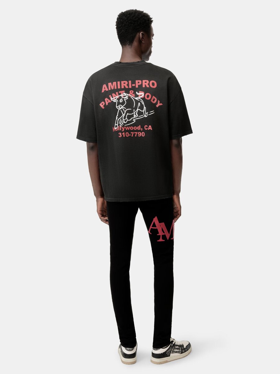 JEAN SKINNY AVEC LOGO DÉCALÉ - Noir Rouge