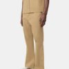 PANTALON CHINO À JAMBES ÉVASÉES